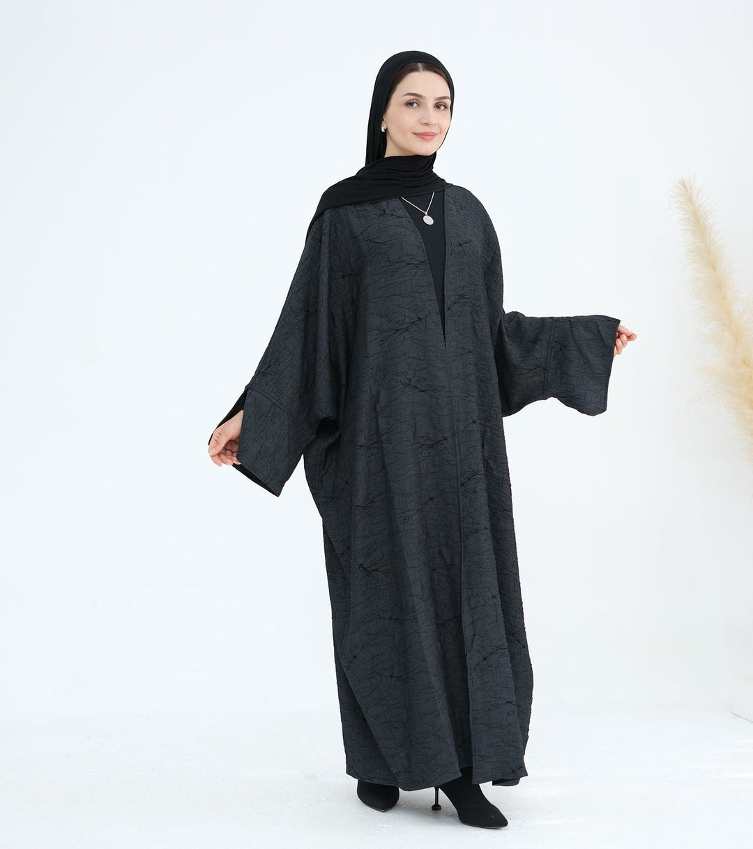 Get trendy with Nixie Textured Reversible Kimono Abaya - Gray Black - Cardigan available at Voilee NY. Grab yours for $74.90 today!