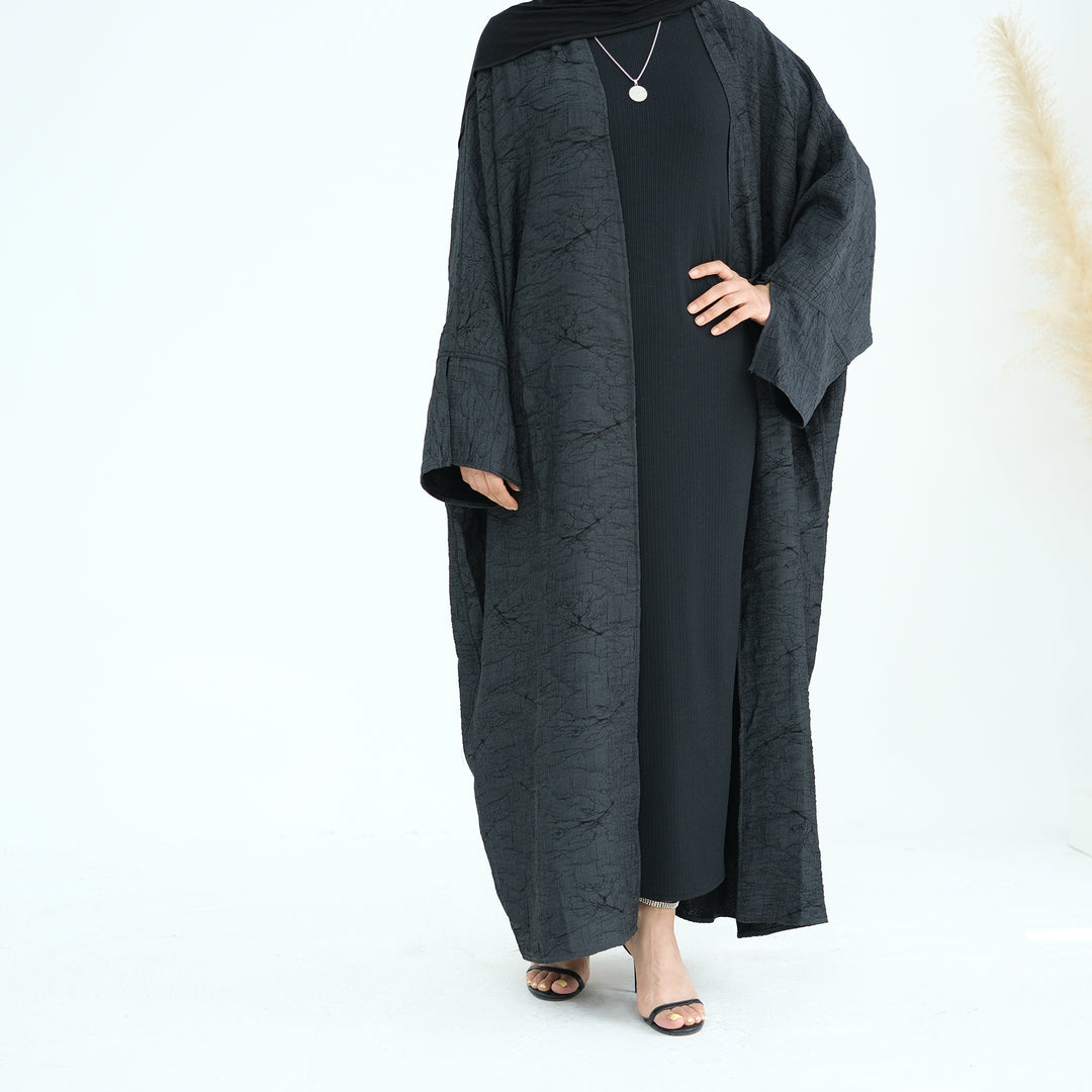 Get trendy with Nixie Textured Reversible Kimono Abaya - Gray Black - Cardigan available at Voilee NY. Grab yours for $74.90 today!