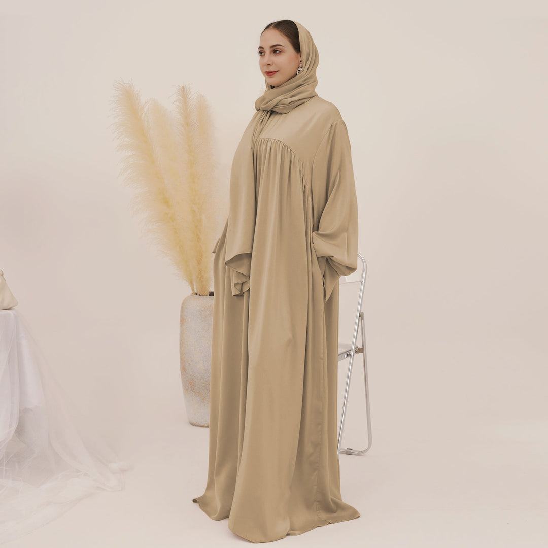 Get trendy with Amelia Satin Abaya Set - Champagne - Dresses available at Voilee NY. Grab yours for $64.99 today!