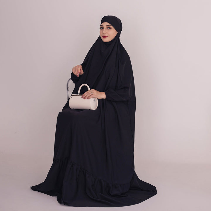 Get trendy with Anissa Jilbab - Black - Dresses available at Voilee NY. Grab yours for $74.90 today!