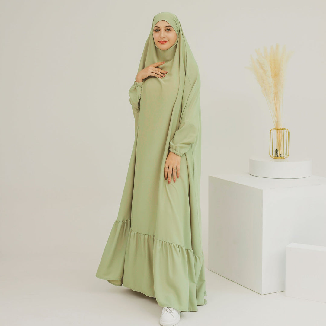 Get trendy with Anissa Jilbab - Mint - Dresses available at Voilee NY. Grab yours for $74.90 today!