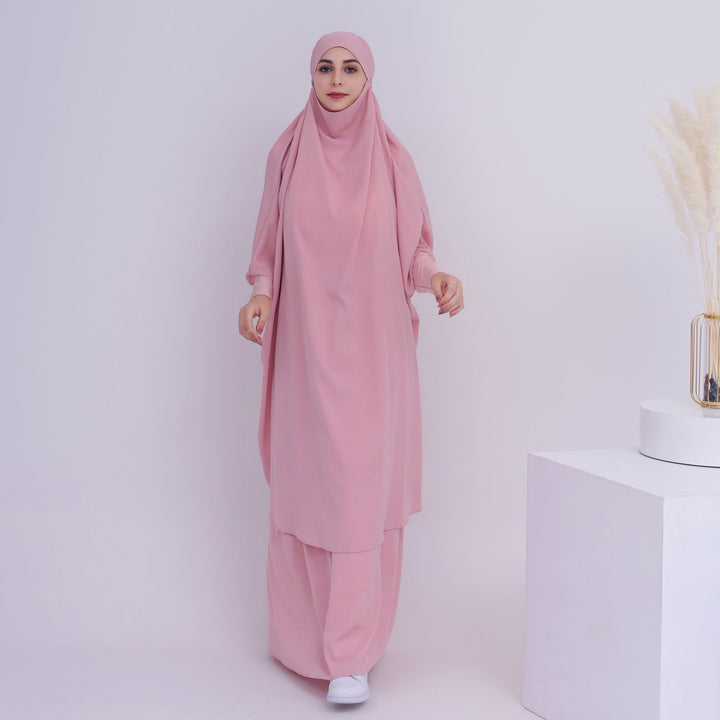 Get trendy with 2-piece Amira Jilbab - pink - Skirts available at Voilee NY. Grab yours for $74.90 today!
