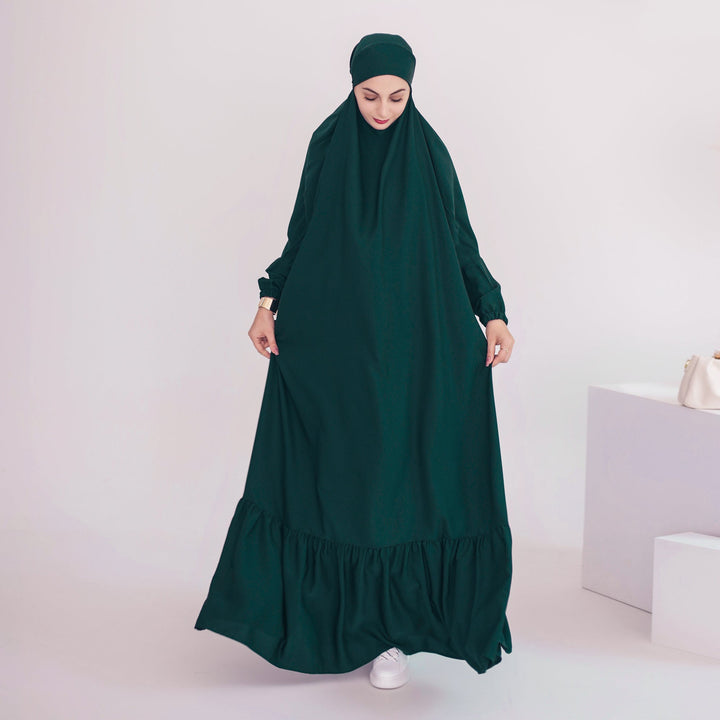 Get trendy with Anissa Jilbab - Hunter - Dresses available at Voilee NY. Grab yours for $74.90 today!