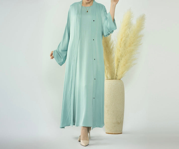 Get trendy with Raïssa 2-Piece Abaya Set - Aqua -  available at Voilee NY. Grab yours for $110 today!