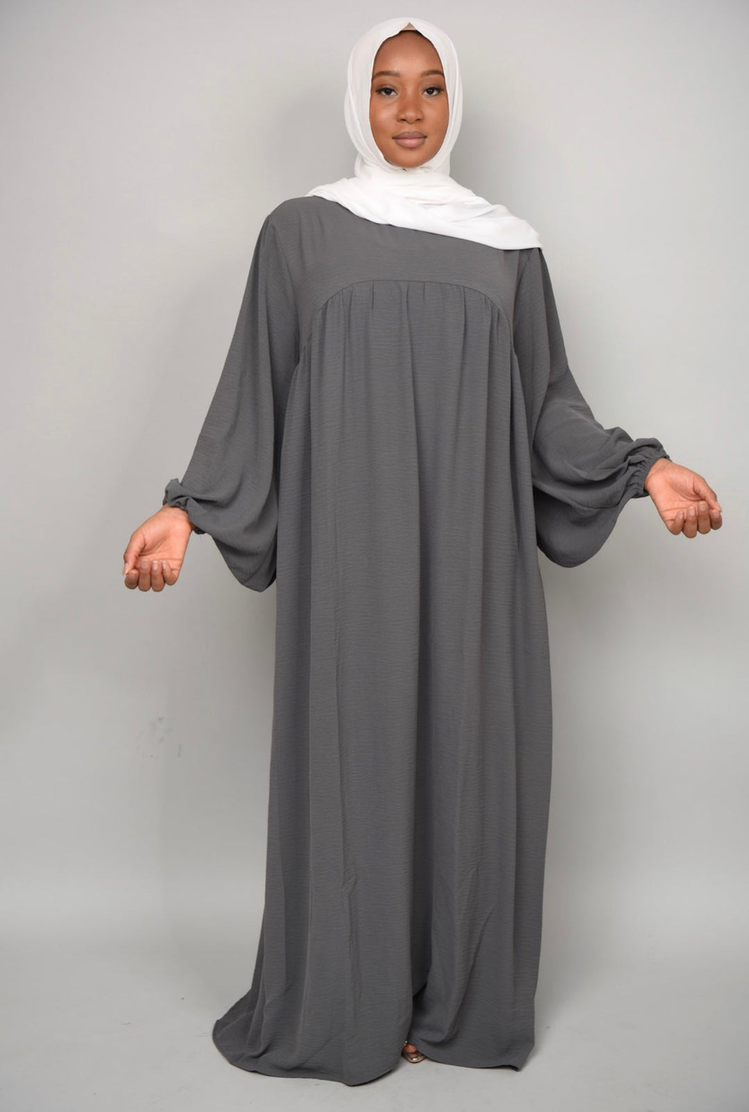 Get trendy with Amelia Textured Abaya - Dark Gray -  available at Voilee NY. Grab yours for $54.90 today!