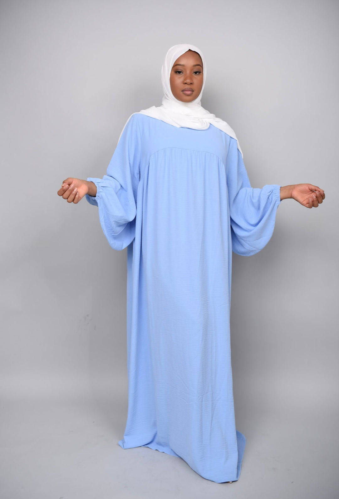 Get trendy with Amelia Textured Abaya - Blue -  available at Voilee NY. Grab yours for $54.90 today!