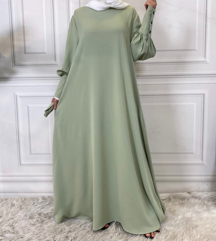 Get trendy with Jamila Abaya - Mint -  available at Voilee NY. Grab yours for $49.99 today!