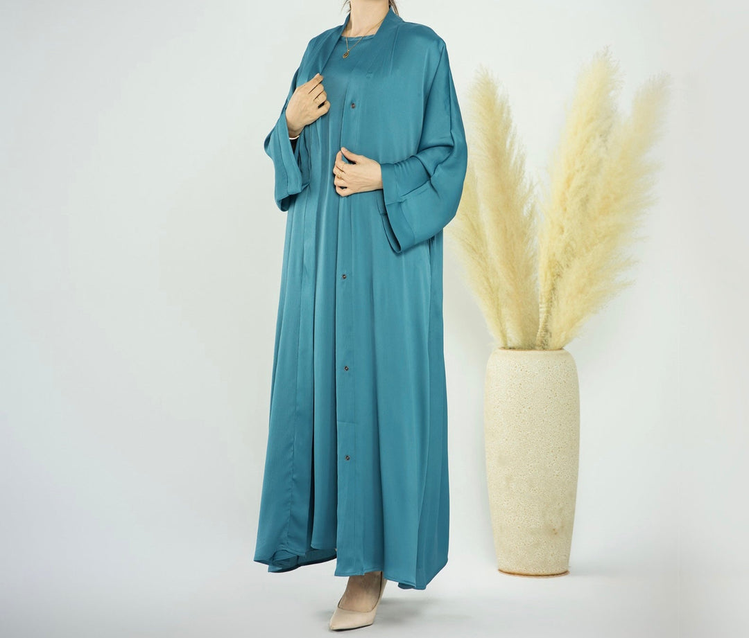 Get trendy with Raïssa 2-Piece Abaya Set - Turquoise -  available at Voilee NY. Grab yours for $110 today!