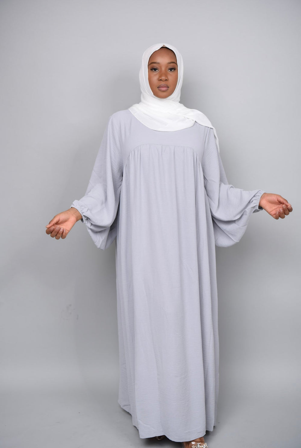 Get trendy with Amelia Textured Abaya - Light gray -  available at Voilee NY. Grab yours for $54.90 today!