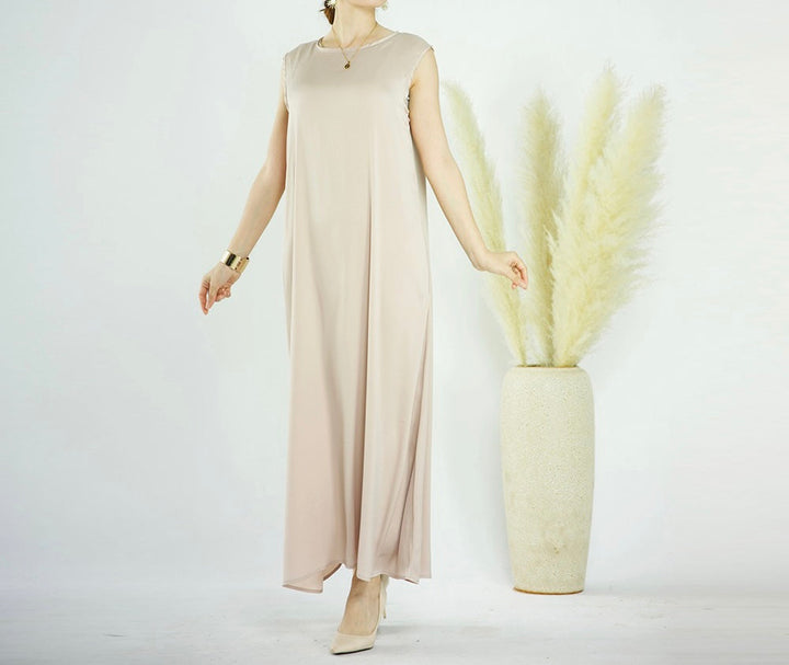 Get trendy with Raïssa 2-Piece Abaya Set - Champagne -  available at Voilee NY. Grab yours for $110 today!