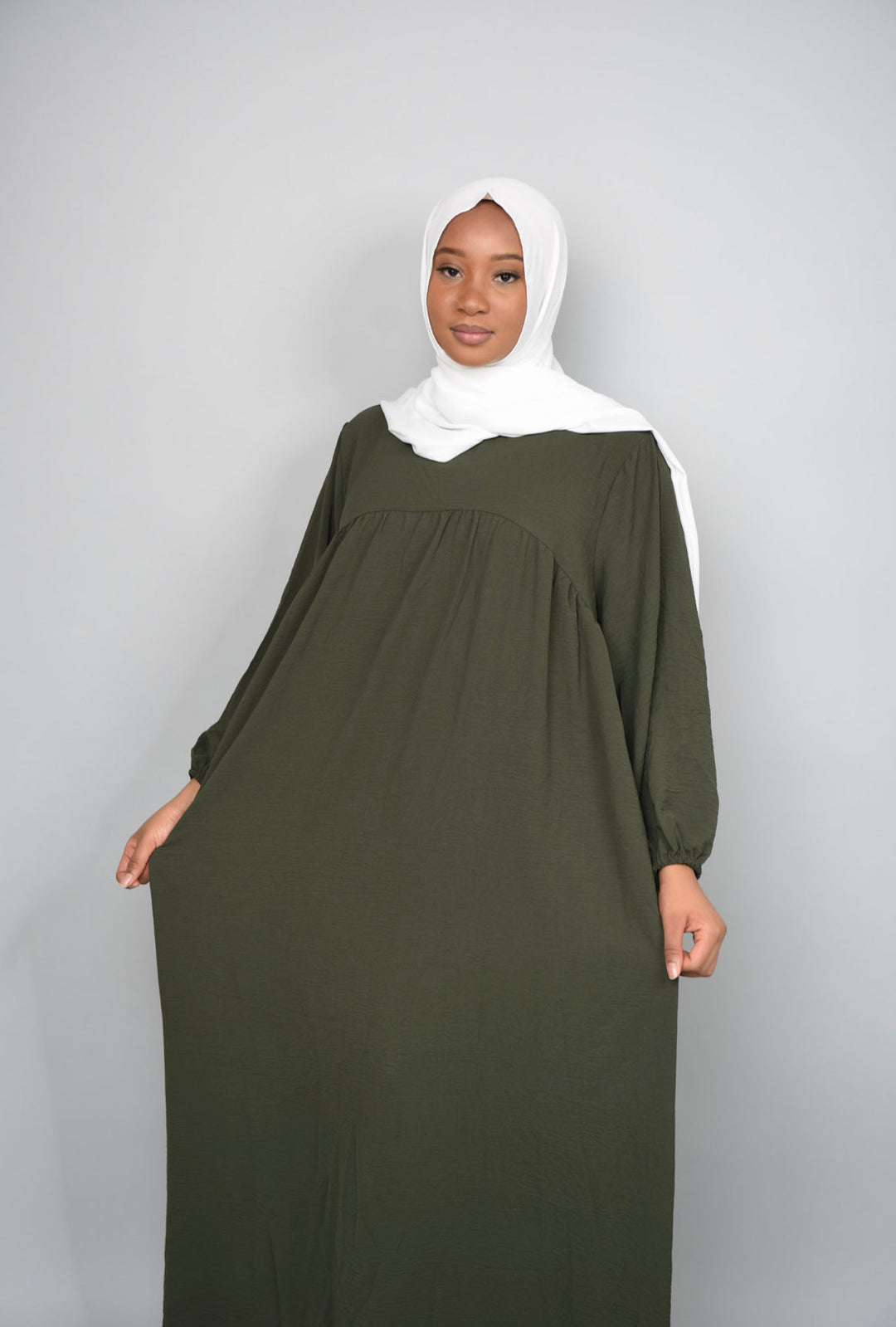 Get trendy with Amelia Textured Abaya - Olive -  available at Voilee NY. Grab yours for $54.90 today!