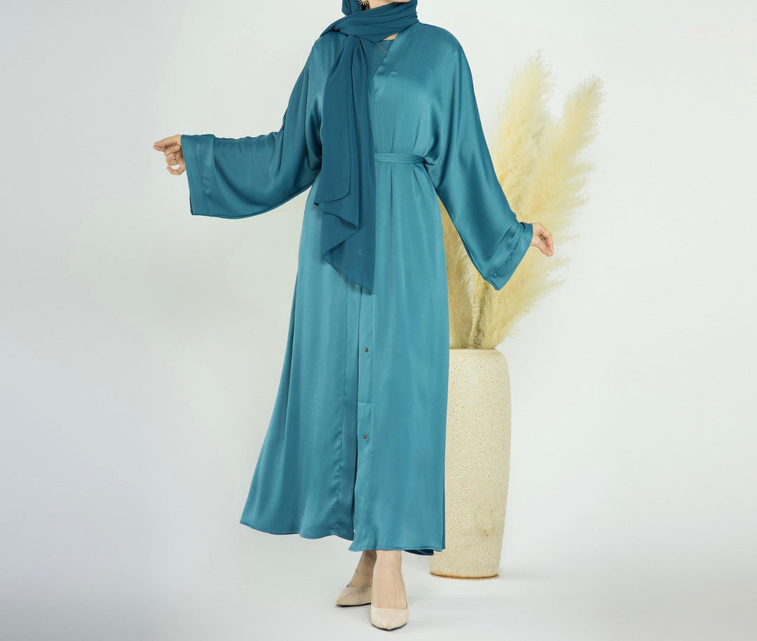 Get trendy with Raïssa 2-Piece Abaya Set - Turquoise -  available at Voilee NY. Grab yours for $110 today!