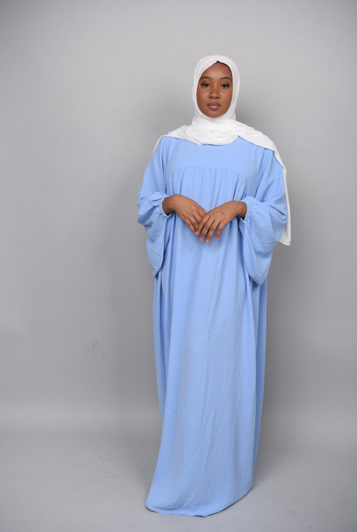 Get trendy with Amelia Textured Abaya - Blue -  available at Voilee NY. Grab yours for $54.90 today!