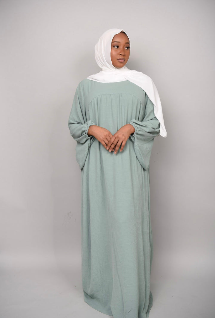Get trendy with Amelia Textured Abaya - Mint -  available at Voilee NY. Grab yours for $54.90 today!