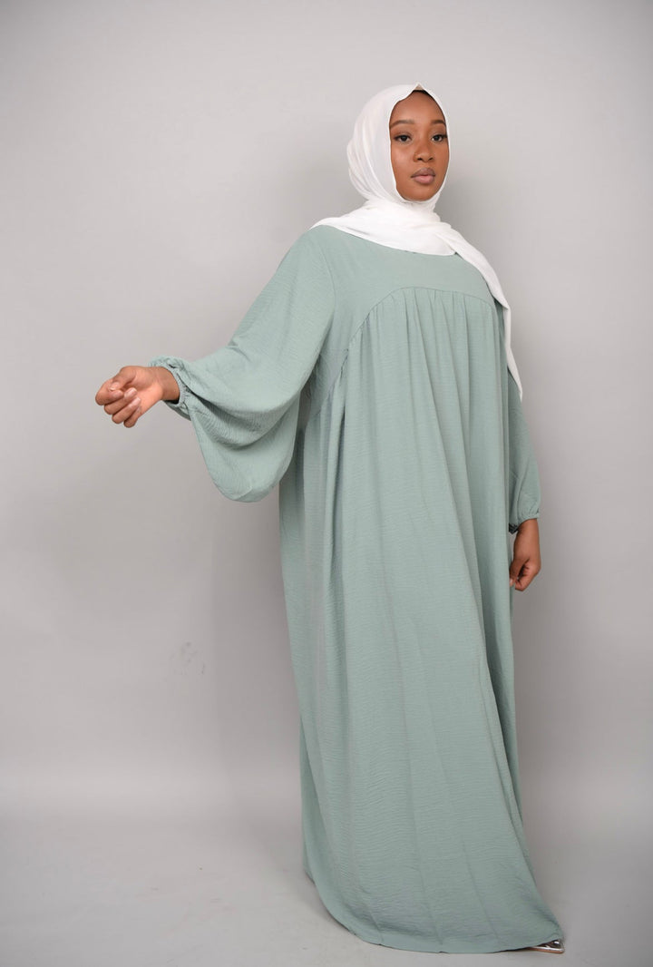 Get trendy with Amelia Textured Abaya - Mint -  available at Voilee NY. Grab yours for $54.90 today!